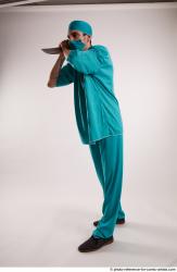 FALCO DOCTOR STANDING POSE WITH KNIFE